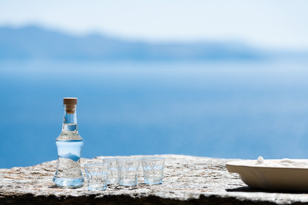 Photo with a bottle and sea at the background